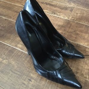 Pointy black stiletto heels